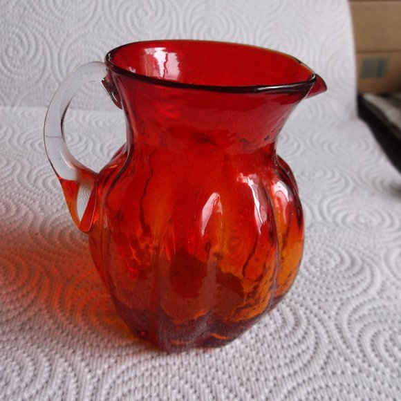 blown glass pitcher with applied handle
